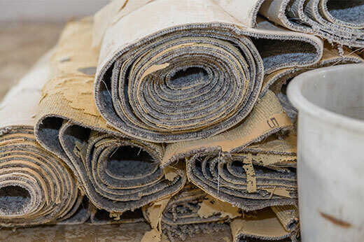Rolled up sections of carpet
